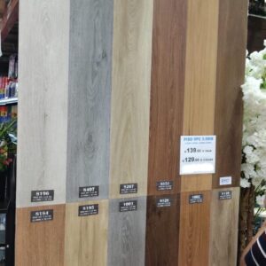 Piso SPC de varios colores 5.5mm 122x18cm caja 2.2m²