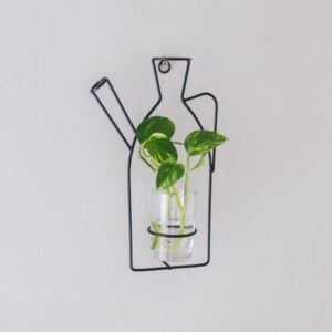 Florero Silueta de Metal Pared con Vaso de Vidrio 16.5 x 26 cm.